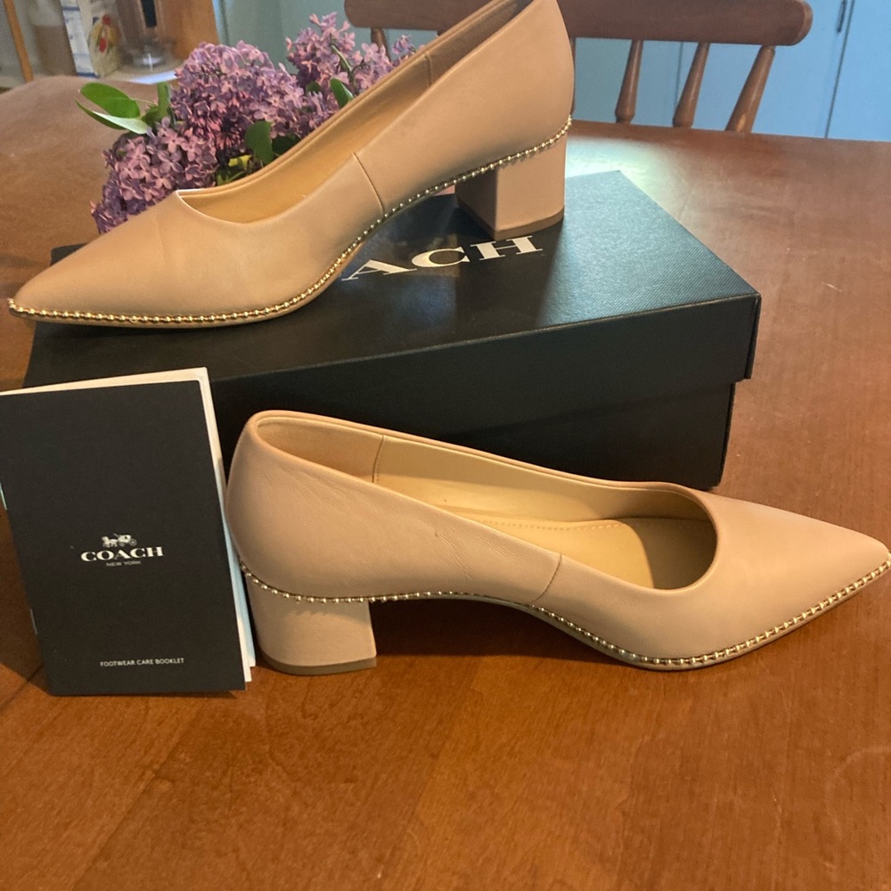 Nude Coach Pointed Toe Flats.
